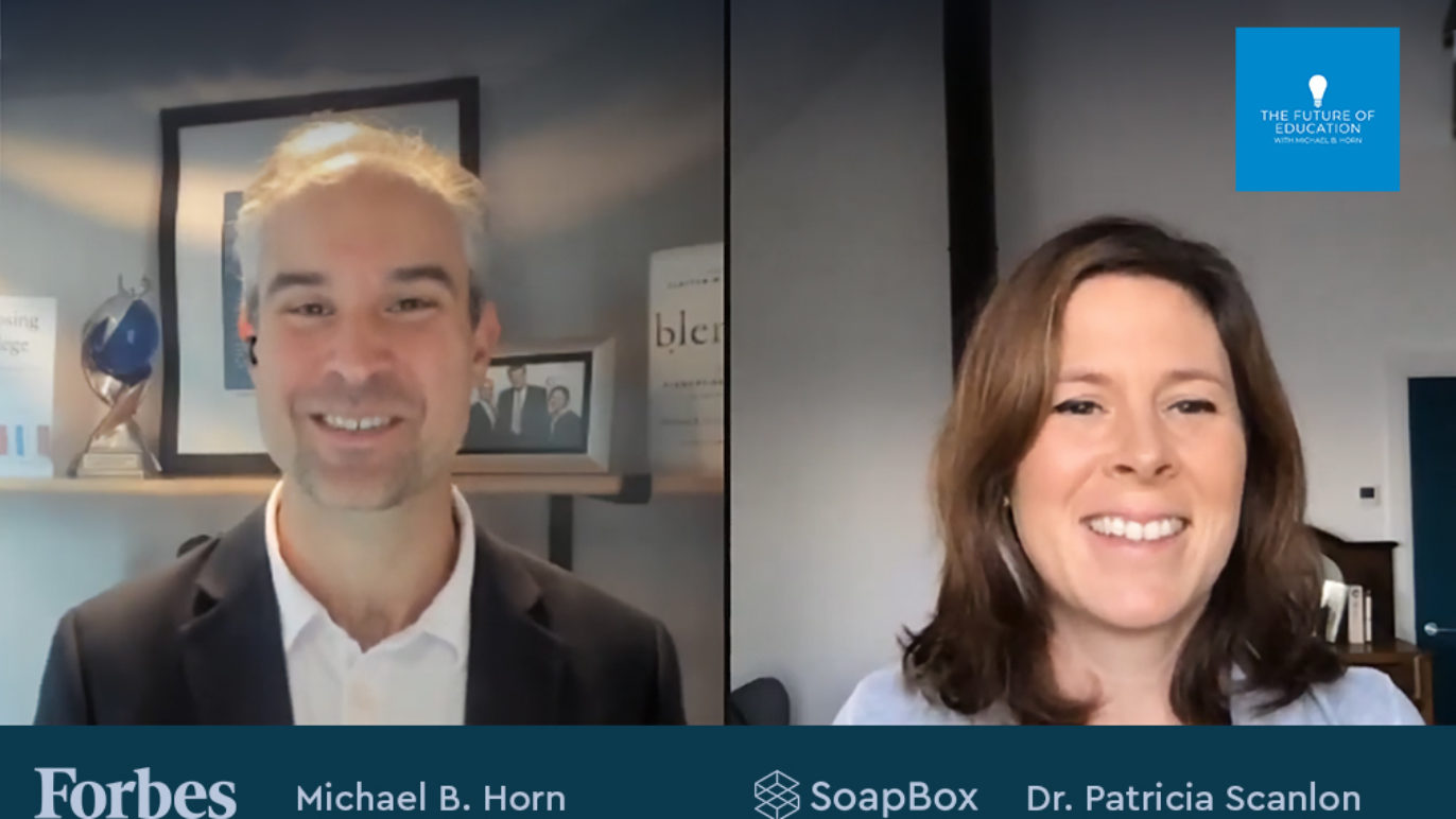 A photo of Dr. Patricia Scanlon of SoapBox Labs and Michael Horn of Forbes.