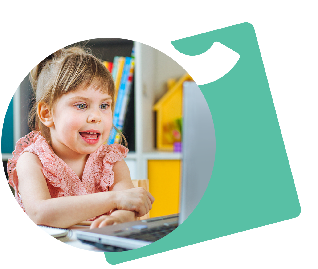 A photo of a girl sitting at a desk talking into a laptop computer