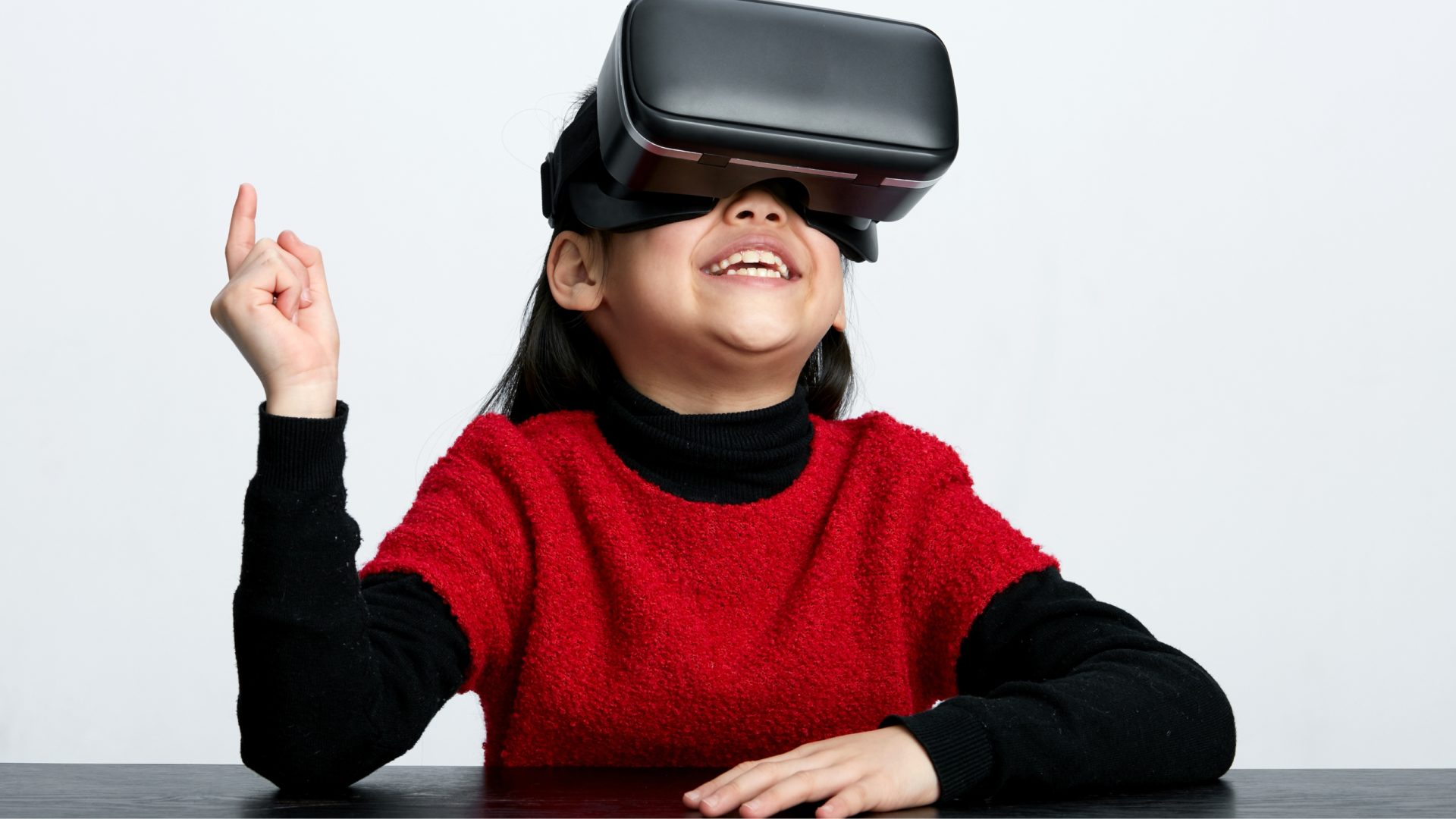 A photo of a girl wearing a VR headset augmented with voice AI.